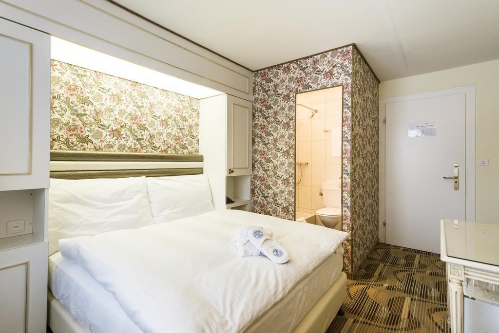 Posthotel Holiday Villa Arosa Room photo